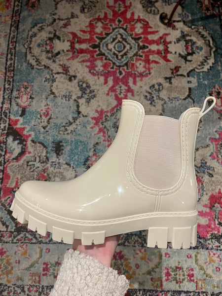 Cream rain boots